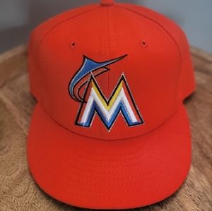 Miami Marlins New Era hat.
